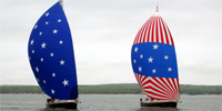 2 Sailboats sailing with spinnakers